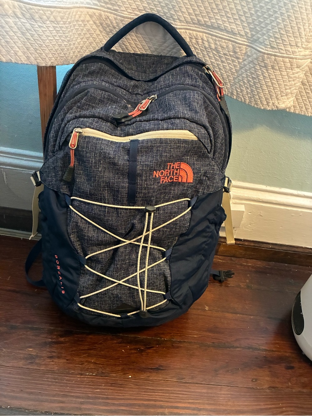 The North Face Navy Heather Backpack with hot pink Logo